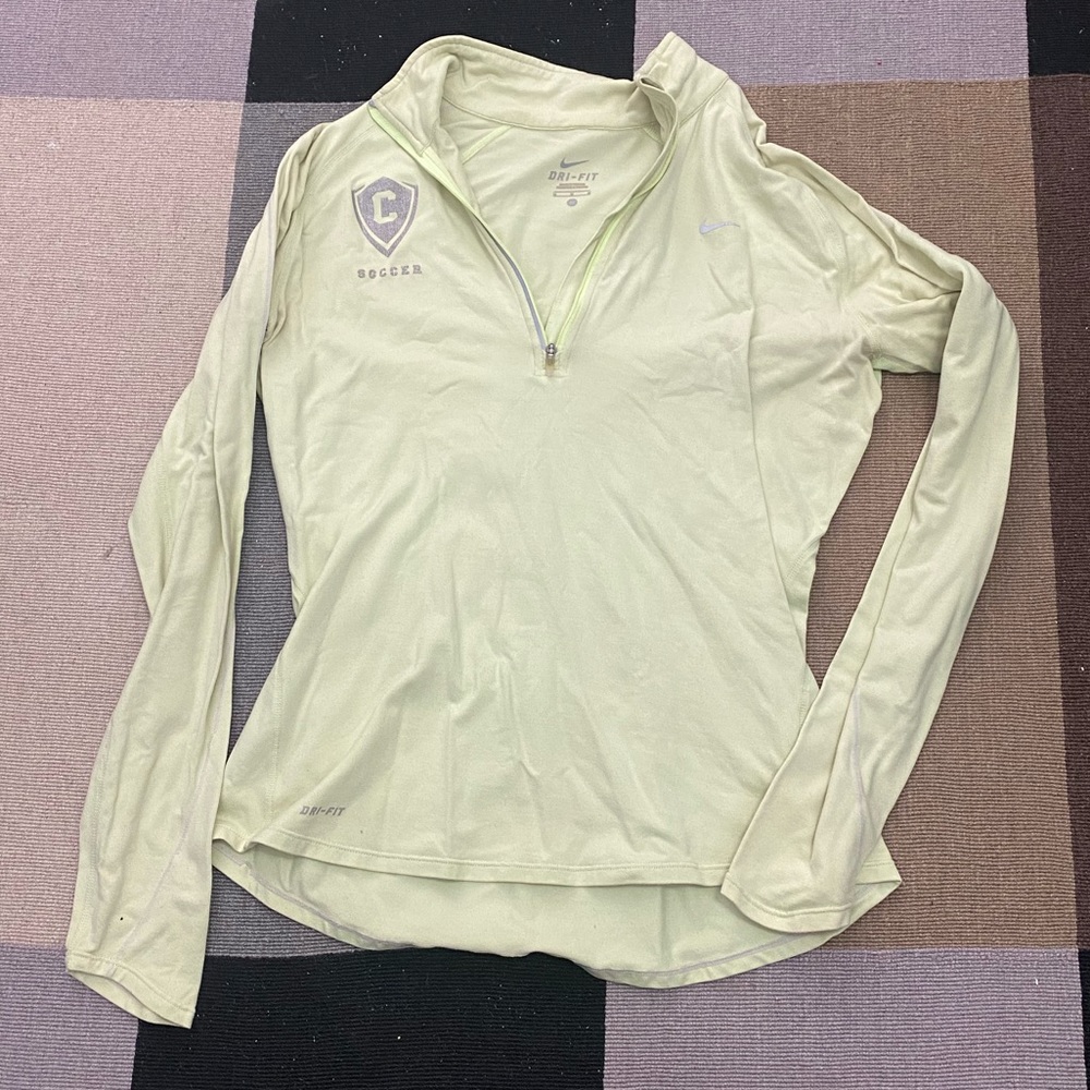 Nike Fri-fit half zip running shirt. Concordia University logo on front.